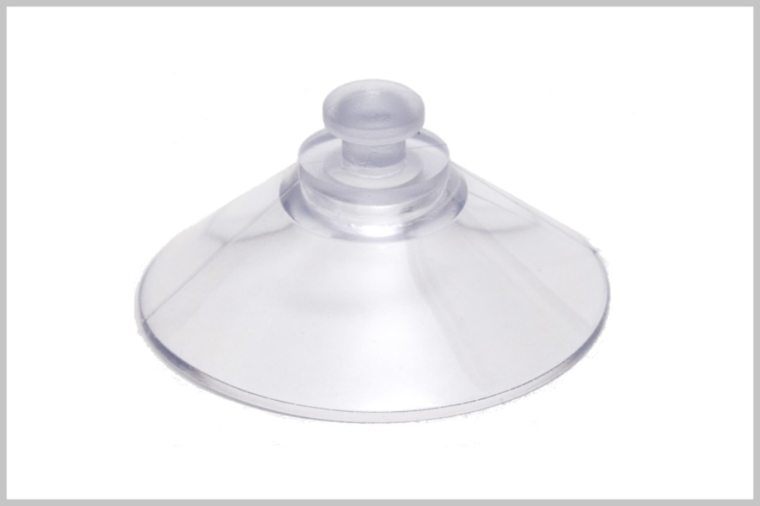 Suction cup with button